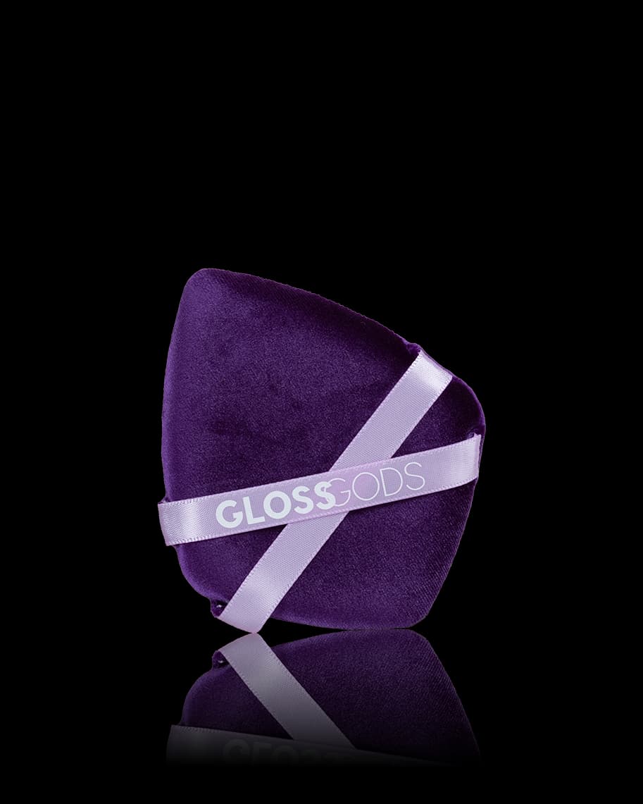 Purple velvet triangular powder puff tied with a lilac GlossGods ribbon