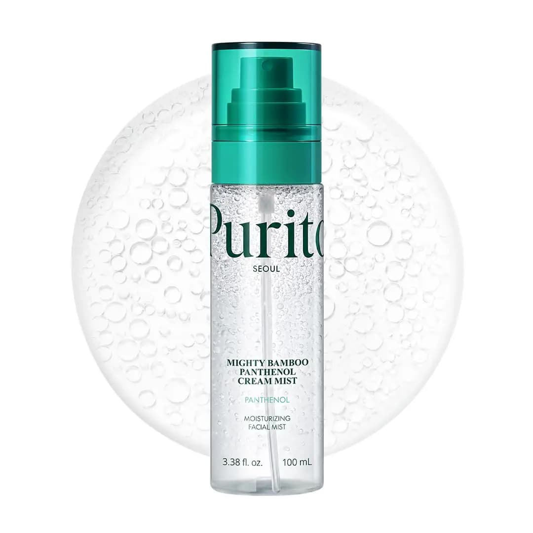 Clear 100 ml Mighty Bamboo Panthenol Cream Mist bottle with teal cap set against a round bubbly texture swatch.