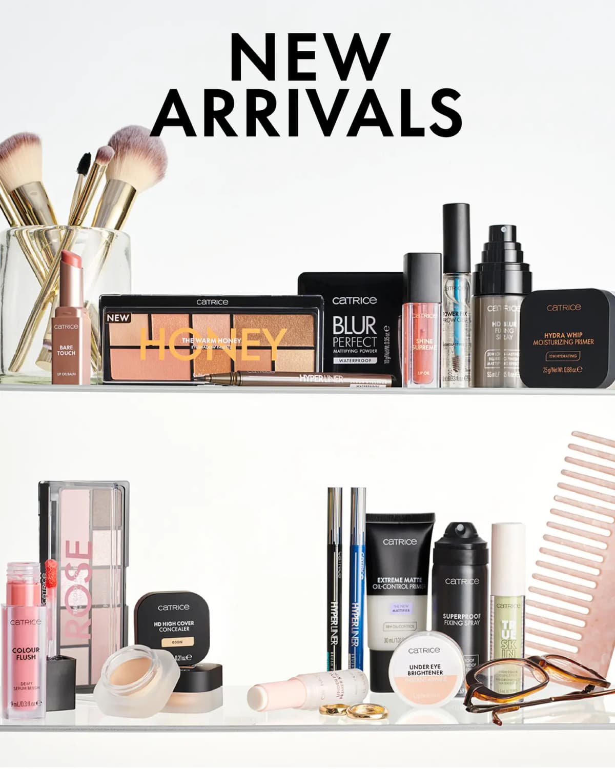 Catrice New Arrivals display with two shelves of makeup brushes, palettes, primers, lip products and accessories