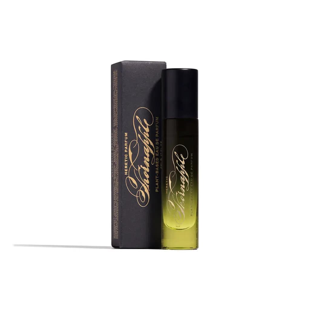 Thornapple 5ml rollerball vial with black cap next to a slim black carton with gold calligraphy.