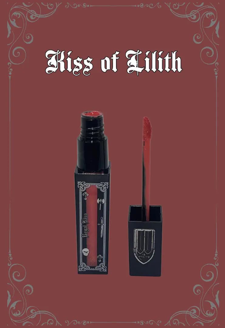 Kiss of Lilith tube open with its wand on a dusty red background framed by silver scrollwork.