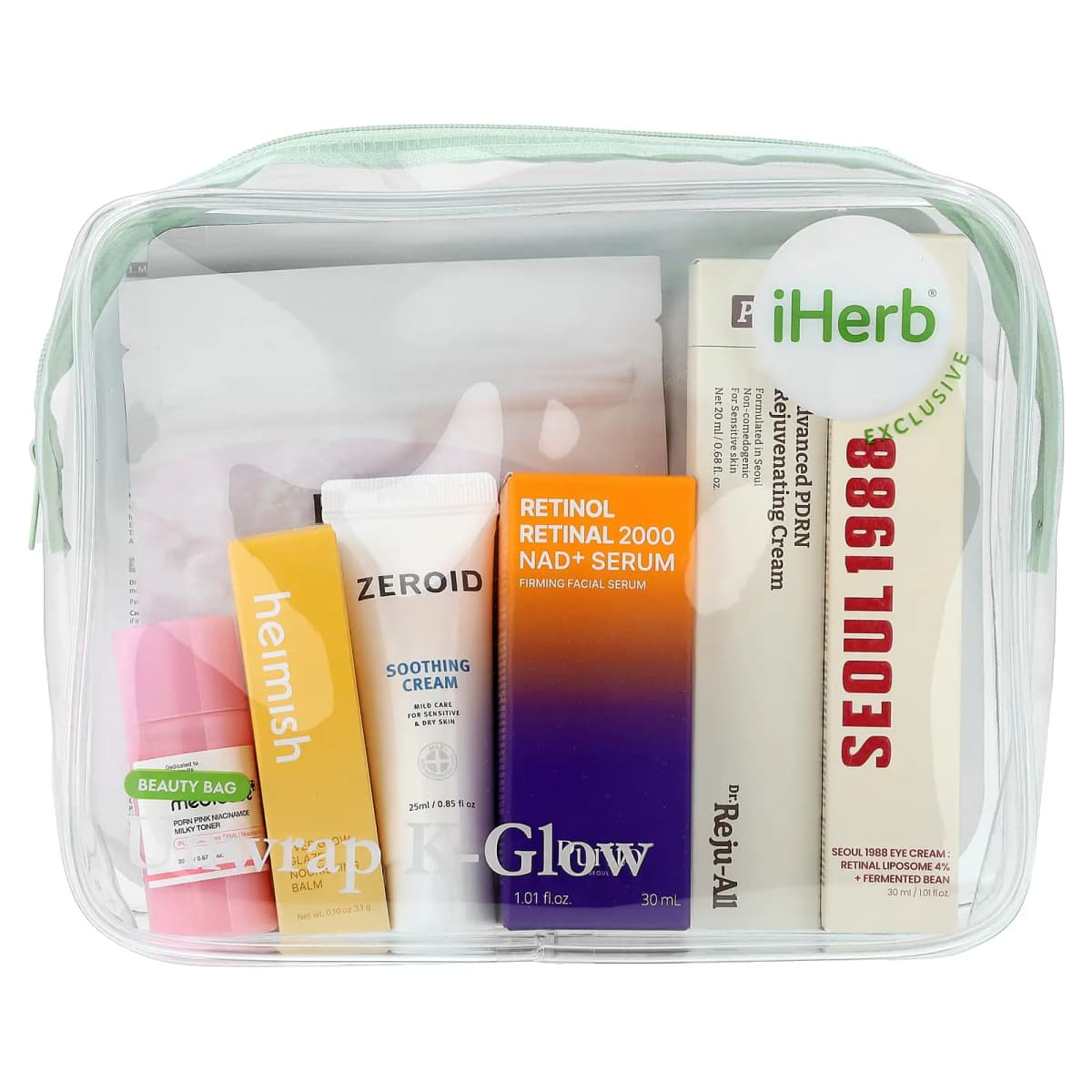 Clear cosmetic bag with green zipper holding Medicube toner, Heimish, Zeroid Soothing Cream, Purito serum, Dr. Rejuall