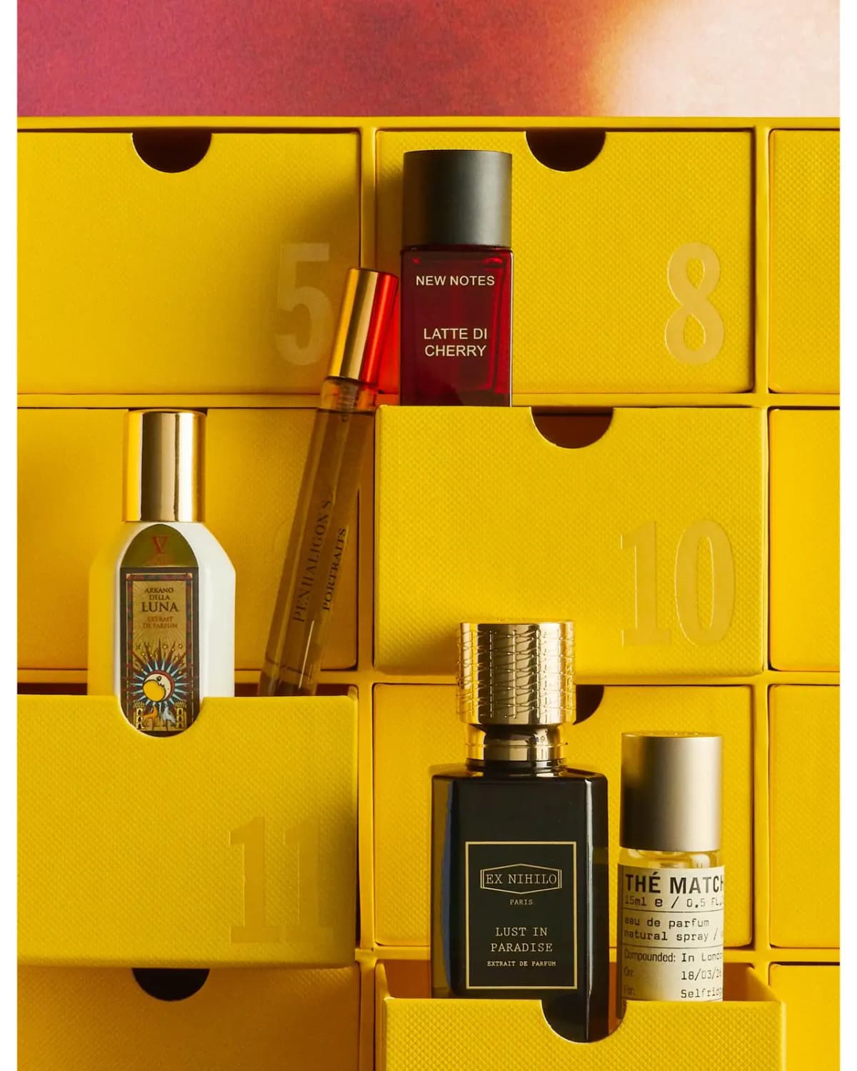 V Canto Arkano Della Luna, Penhaligon's, New Notes and Ex Nihilo bottles tucked into open yellow drawers 5, 10 and 11