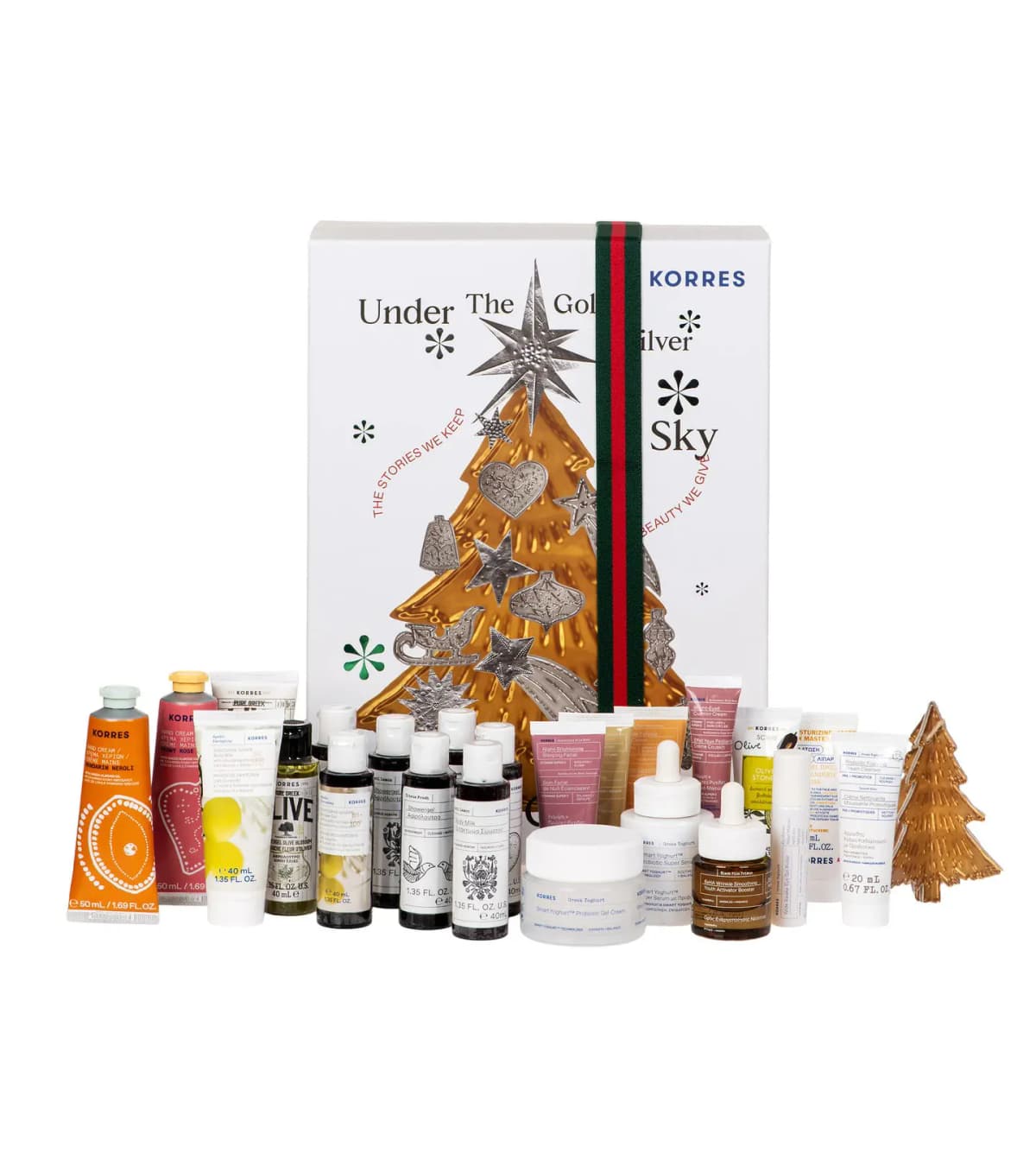 KORRES Advent Calendar box with gold tree and striped band, surrounded by its minis, full sizes and a gold tree ornament