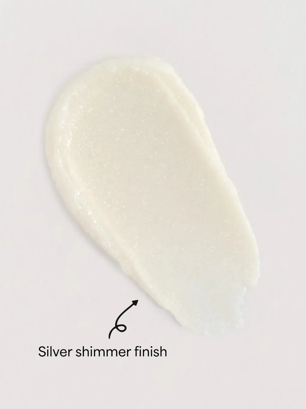 Swatch of the sheer off-white balm with fine silver sparkle, labelled "Silver shimmer finish