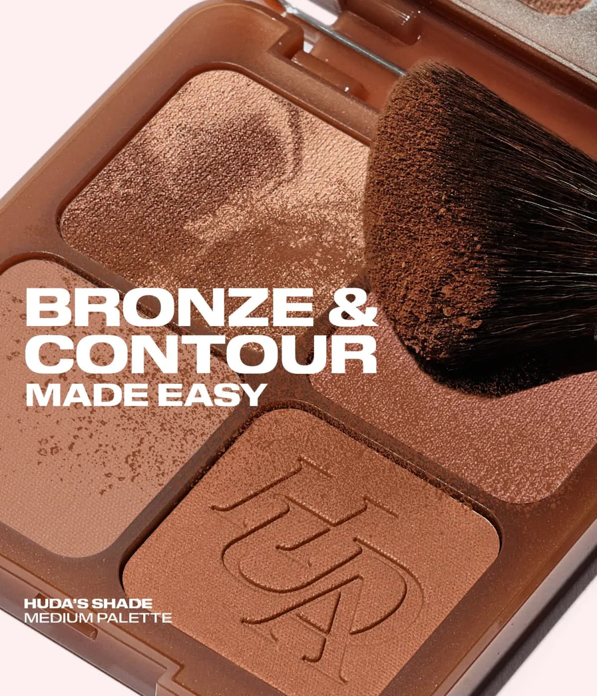 Close-up of a dense brush picking up powder from Huda's shade, the Medium palette, under 'Bronze & Contour Made Easy'.