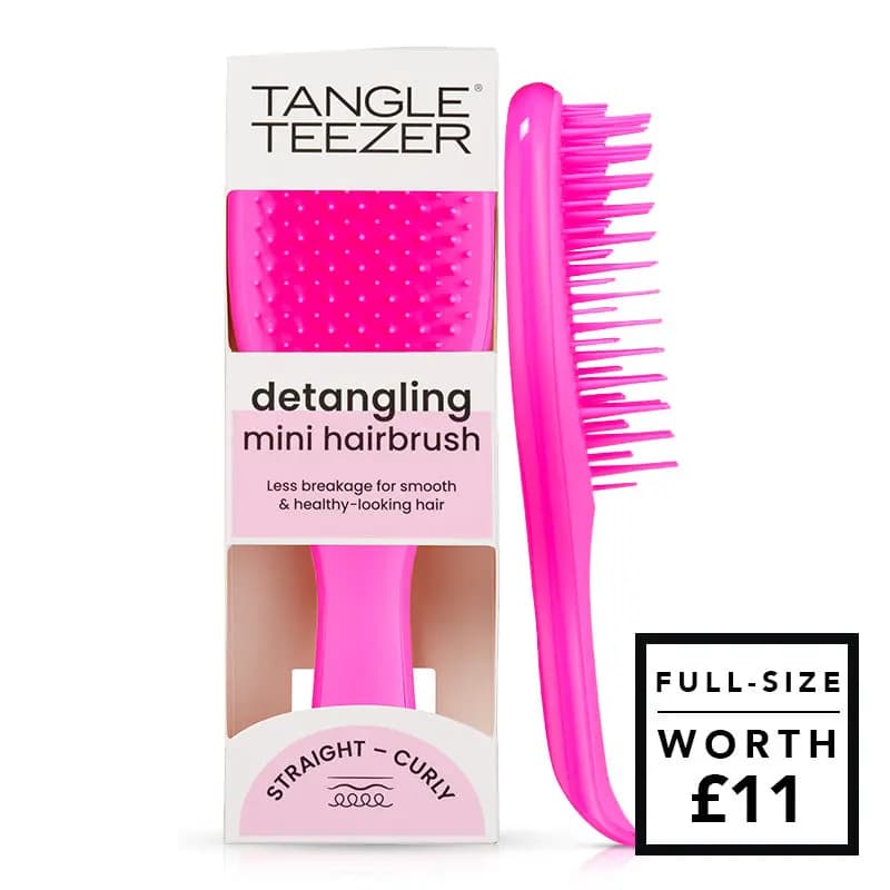Tangle Teezer pink detangling mini hairbrush shown in and beside its box, full-size worth £11