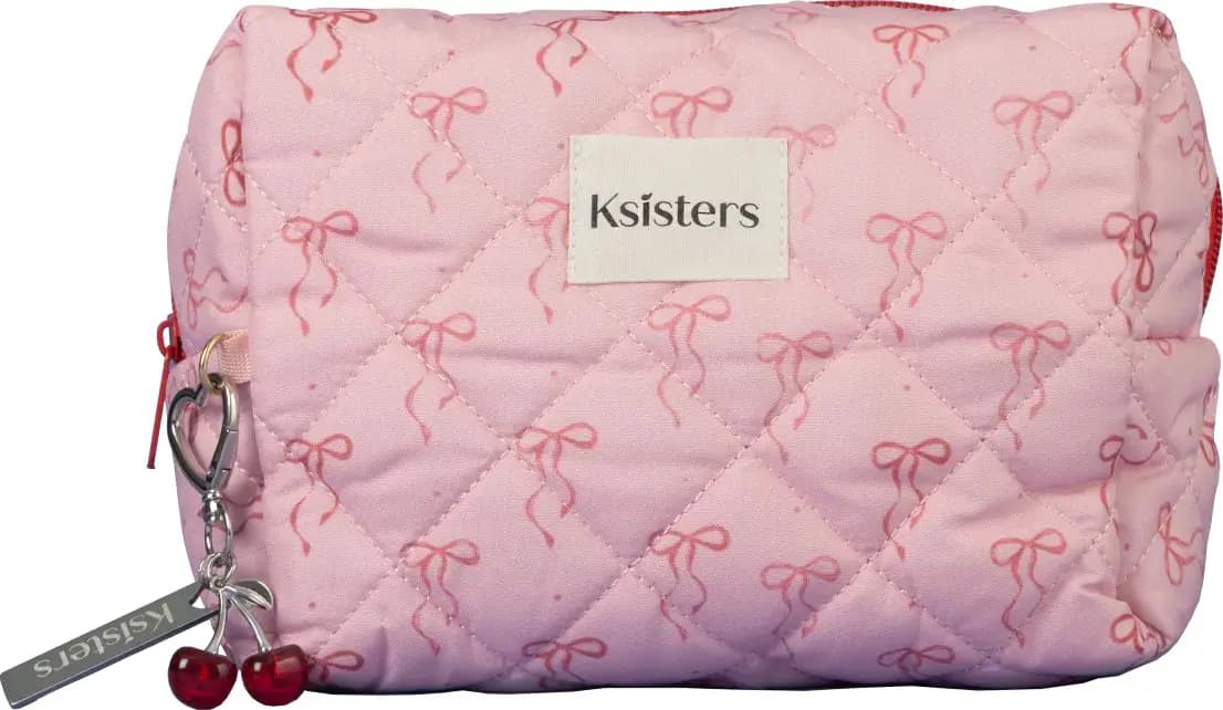 Pink quilted Ksisters cosmetics bag with red bow print, red zip and heart keyring with cherry charm