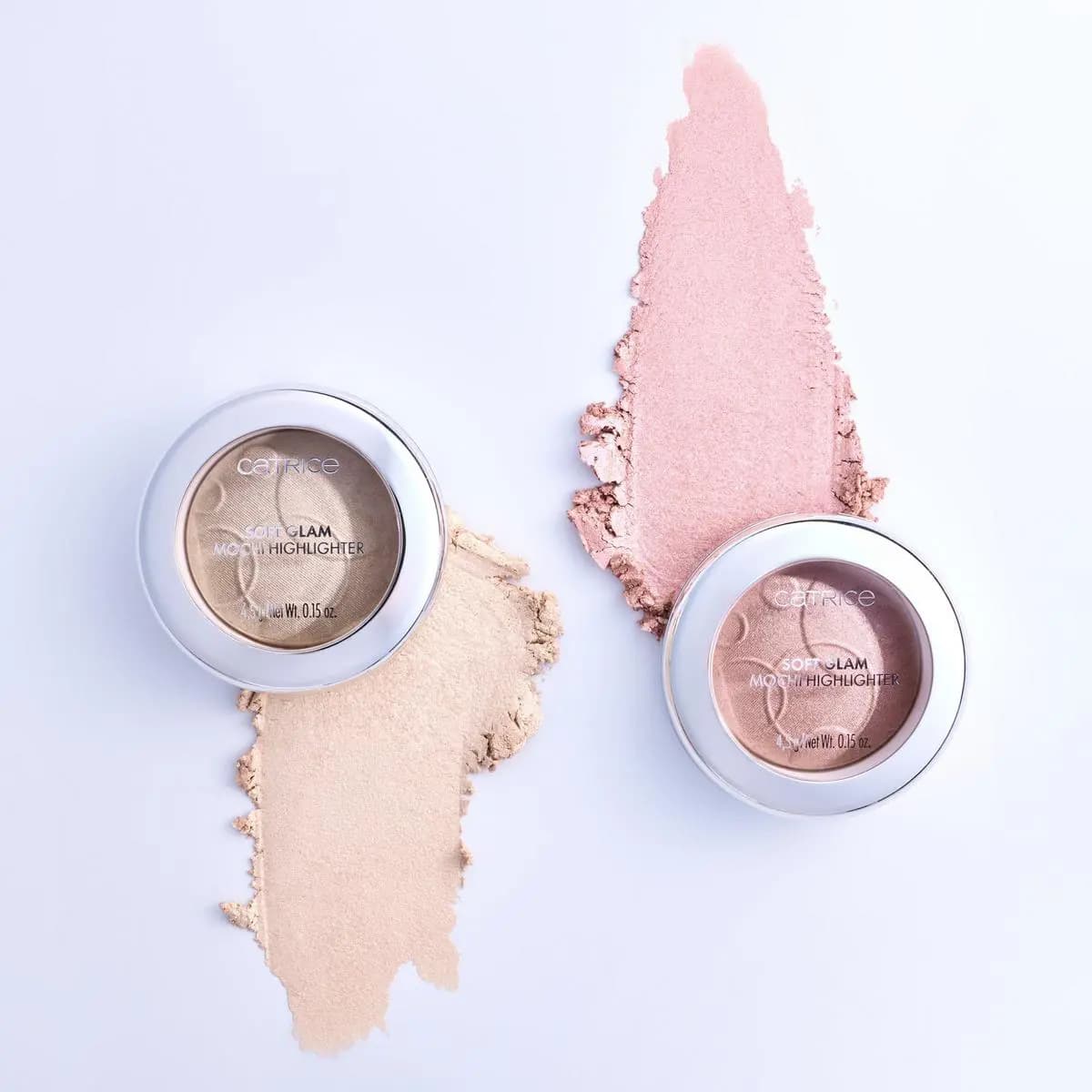 Two Soft Glam Mochi Highlighter compacts in champagne and pink with matching shimmer swatches