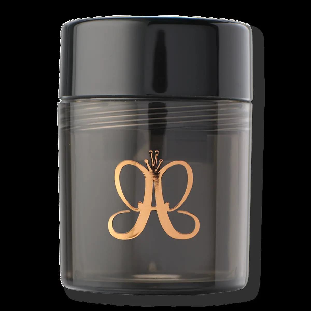 Black cylindrical sharpener jar featuring the gold Anastasia butterfly logo