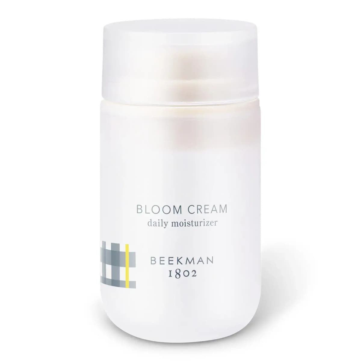 Mini Brands miniature replica of the frosted white Beekman 1802 Bloom Cream daily moisturizer bottle with grey and yellow gingham accent