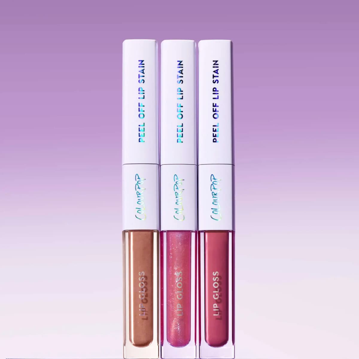 Trio of lip duos showing a golden nude, sparkly sheer pink and berry rose gloss on a lavender background
