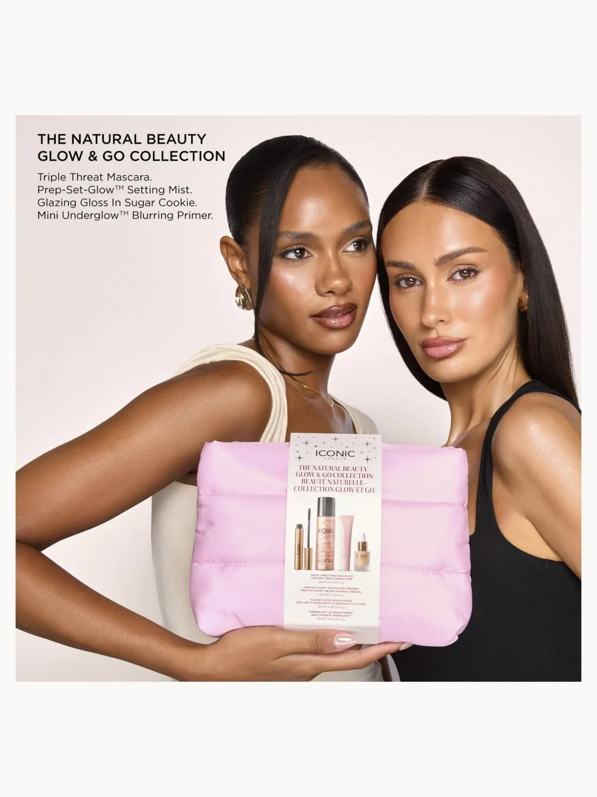Two models with natural glowy makeup holding the pink Natural Beauty Glow & Go Collection pouch