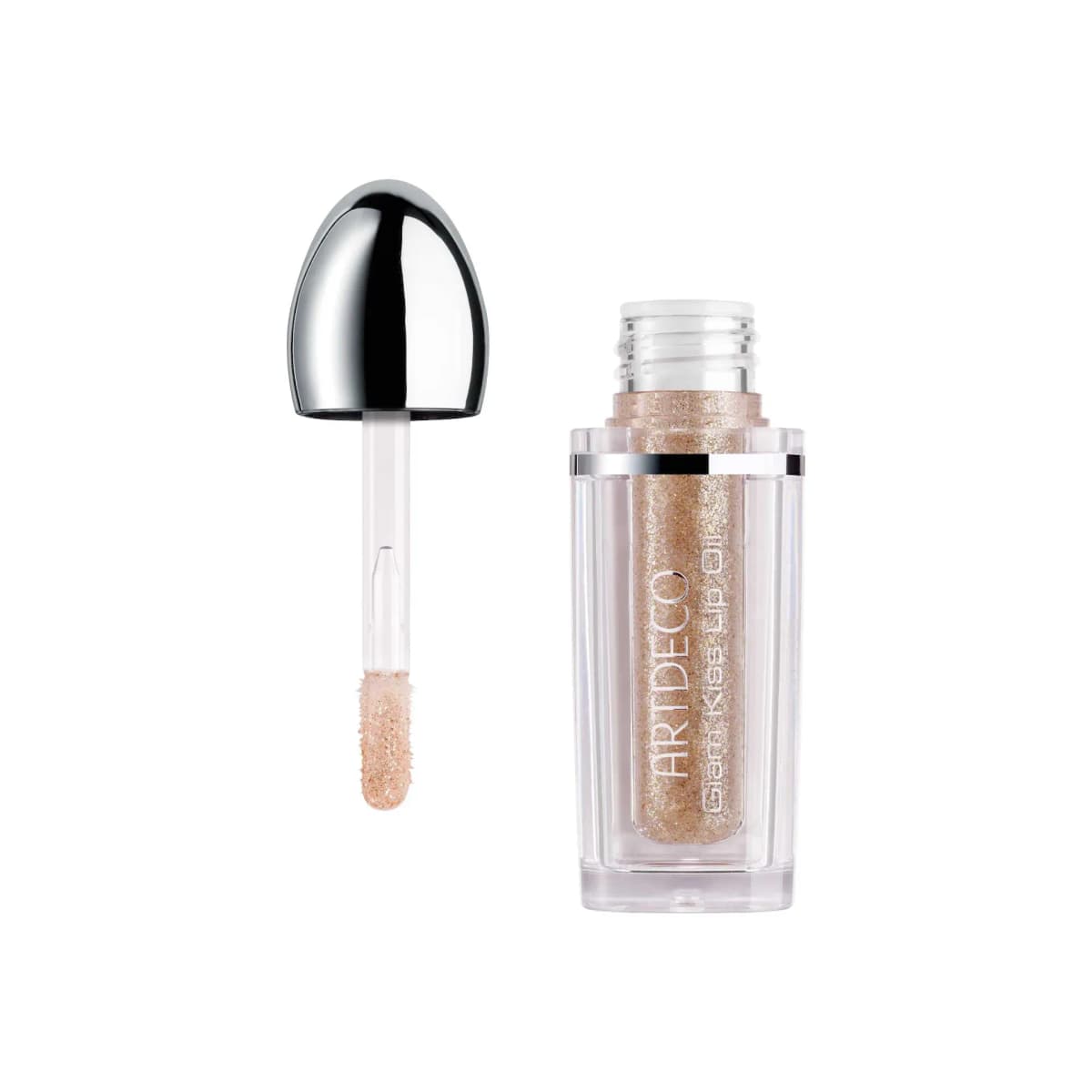 Glam Kiss Lip Oil in a clear gold-glitter shade, open beside its silver cap and glitter-coated applicator