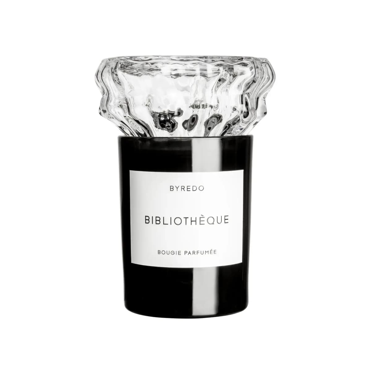 Black Byredo Bibliothèque Bougie Parfumée candle crowned with a wavy clear glass topper
