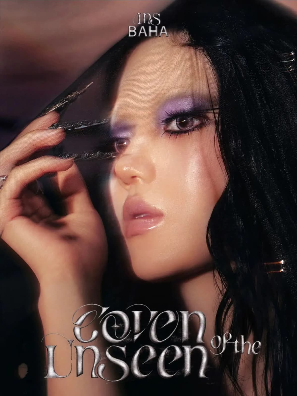 Close-up of a model with smoky purple eyeshadow and glossy lips peering through a black veil under the Coven of the Unseen