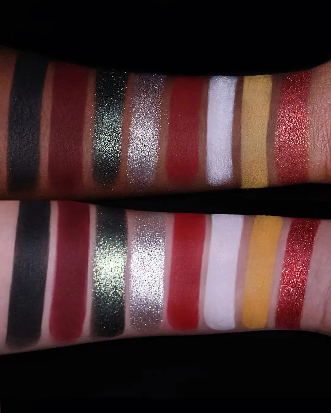 Eyeshadow swatches on deep and light arms: black, burgundy, green glitter, silver, red, white, yellow and red sparkle