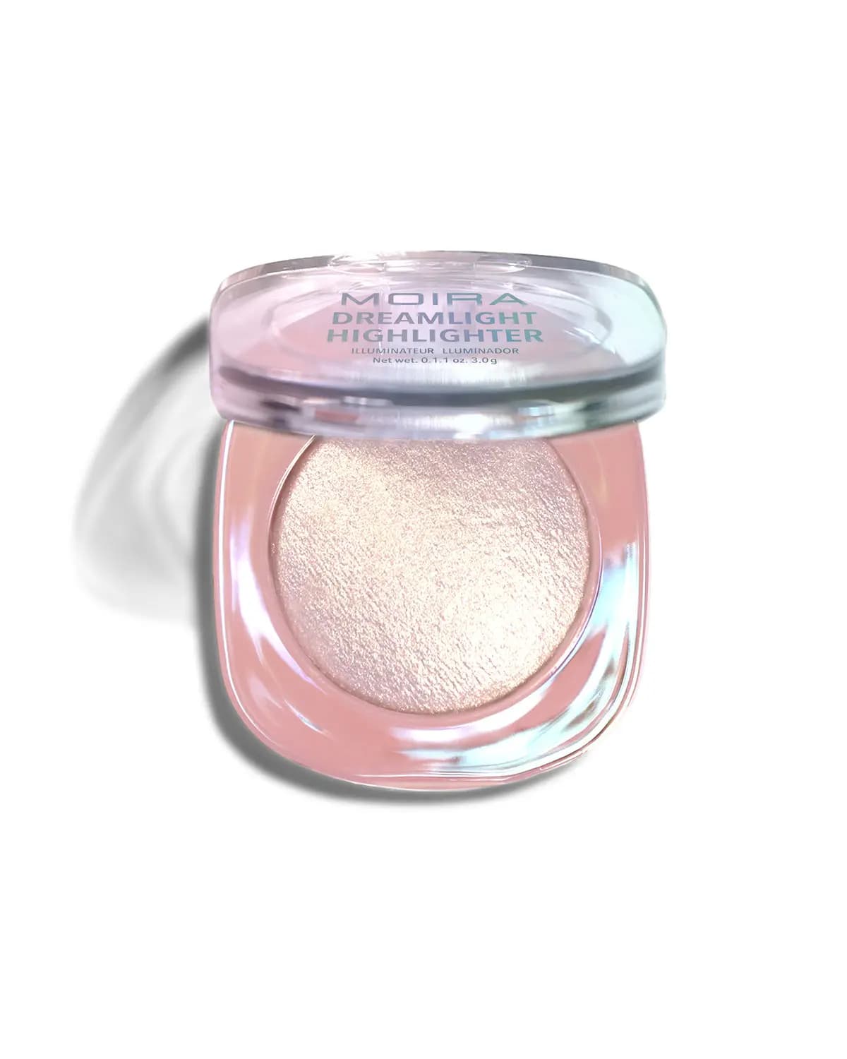 Single Moira Dreamlight Highlighter compact with clear lid showing a champagne pearl baked powder.