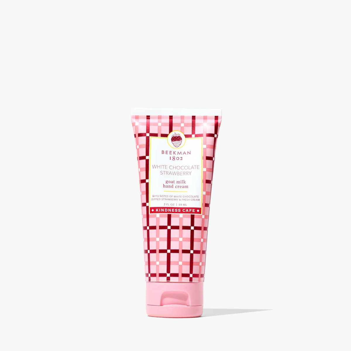 Pink and red plaid tube of Beekman 1802 White Chocolate Strawberry goat milk hand cream, 2 fl oz