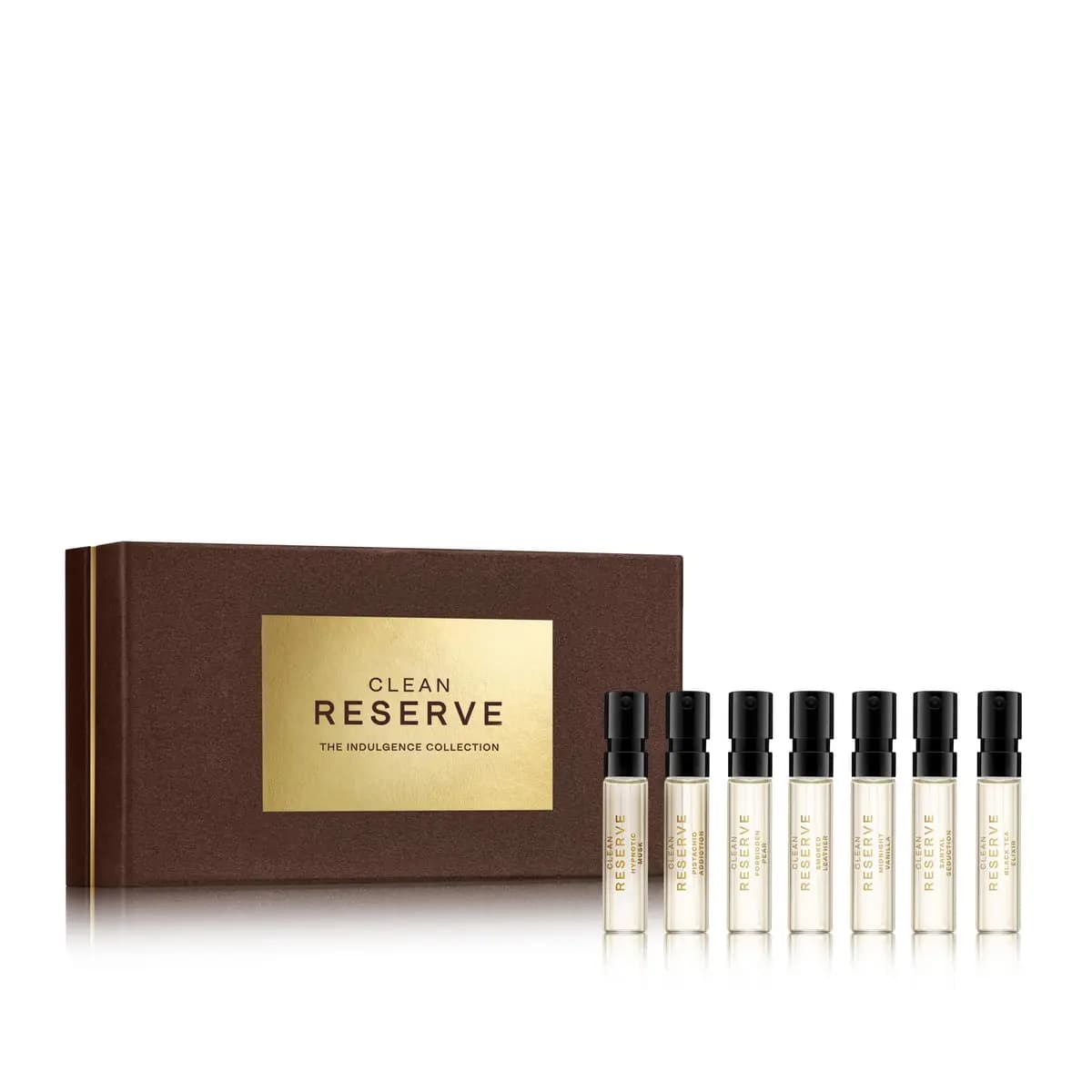 Closed brown Clean Reserve Indulgence Collection box beside a row of seven small spray vials with black caps.