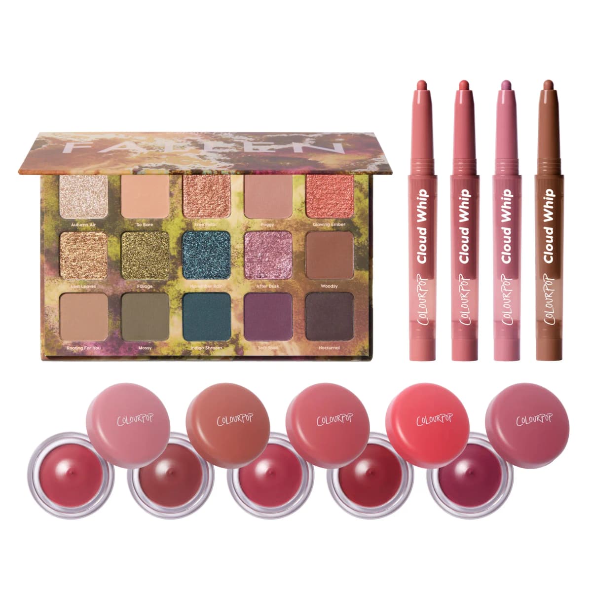 Fallen eyeshadow palette with four Cloud Whip lip liners and five open ColourPop pots with lids on white