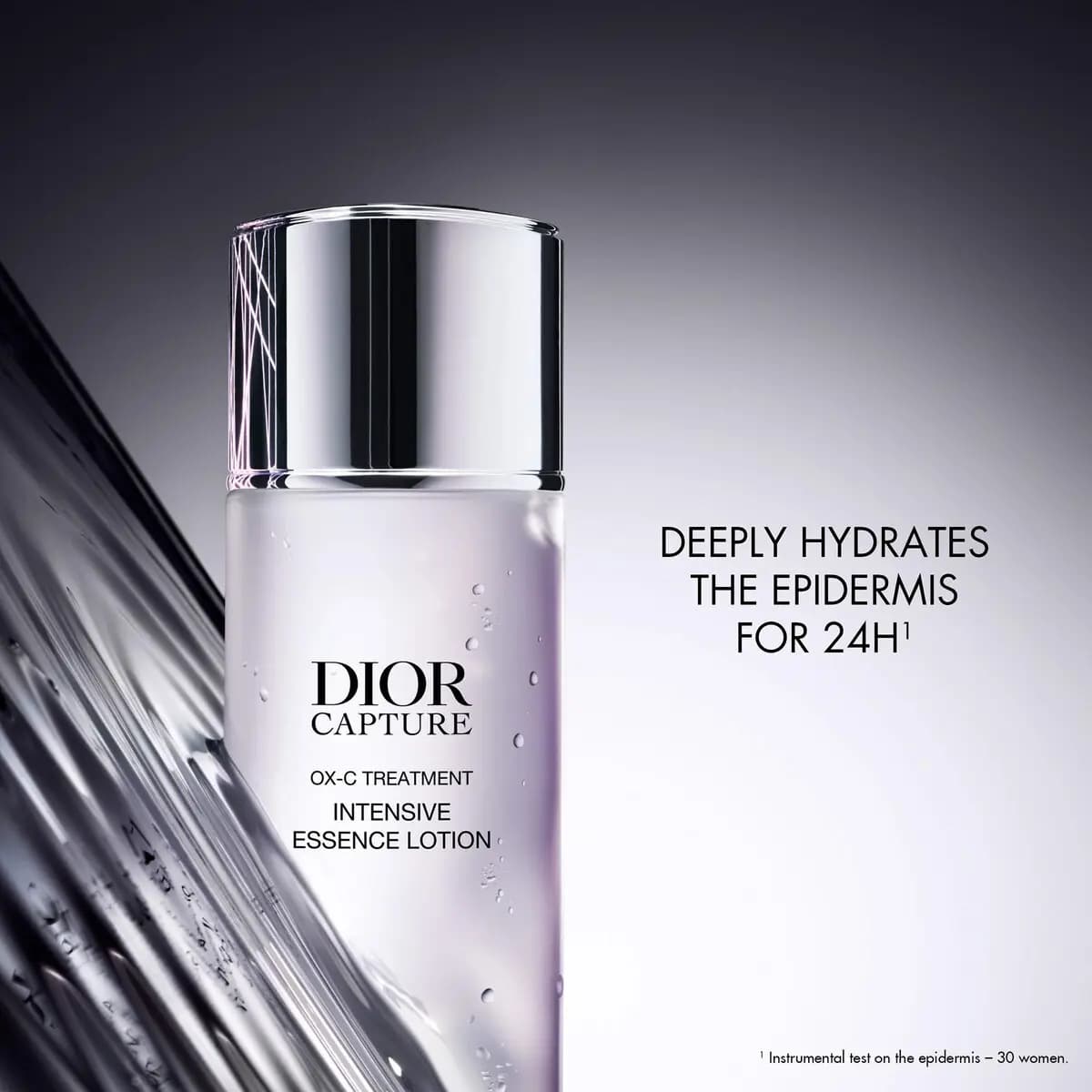 Lotion bottle with water droplets against glassy streaks, with text saying it deeply hydrates the epidermis for 24h.