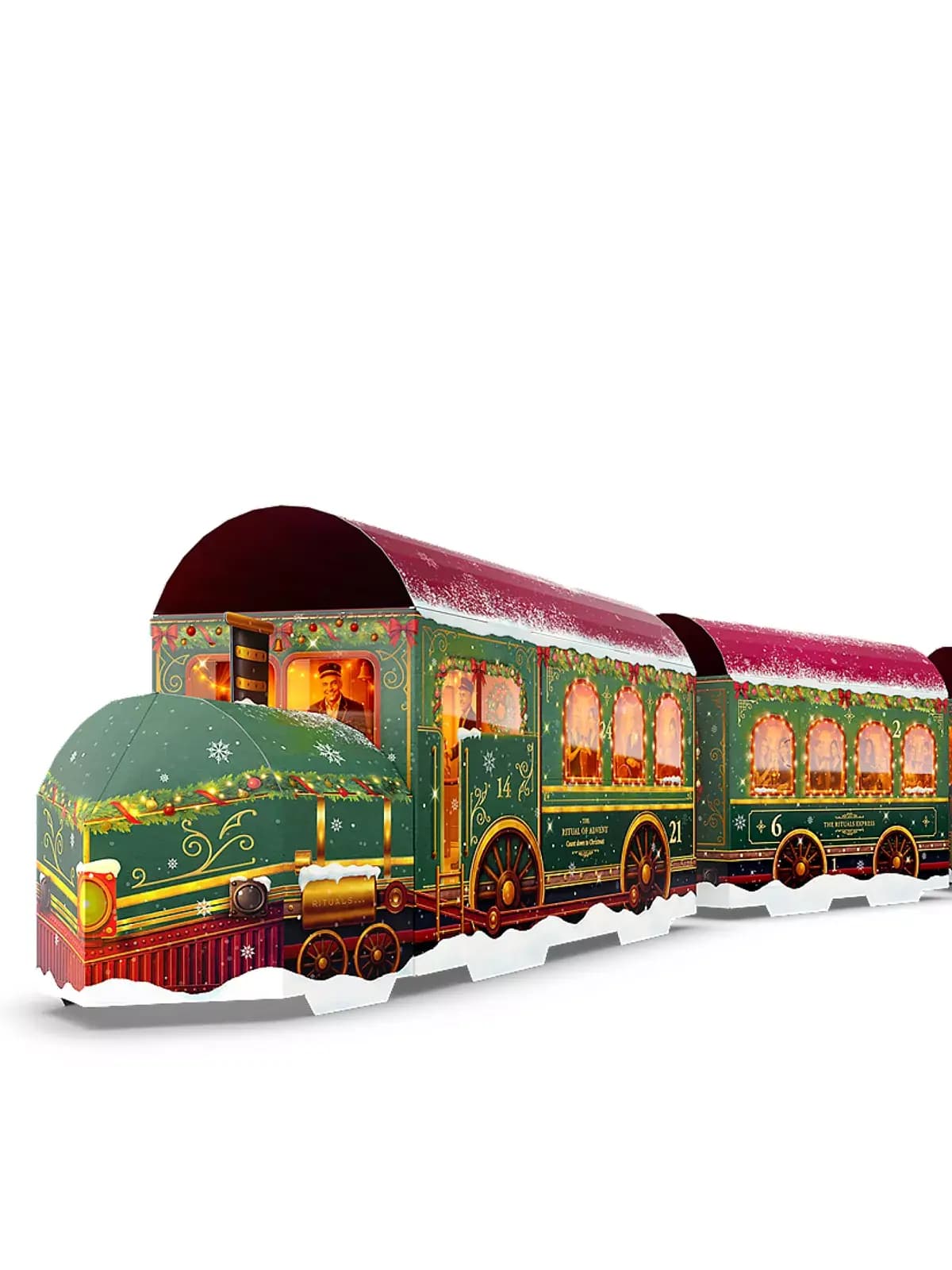 Green and burgundy Rituals Express train-shaped advent calendar with snowy roof and lit carriage windows on white