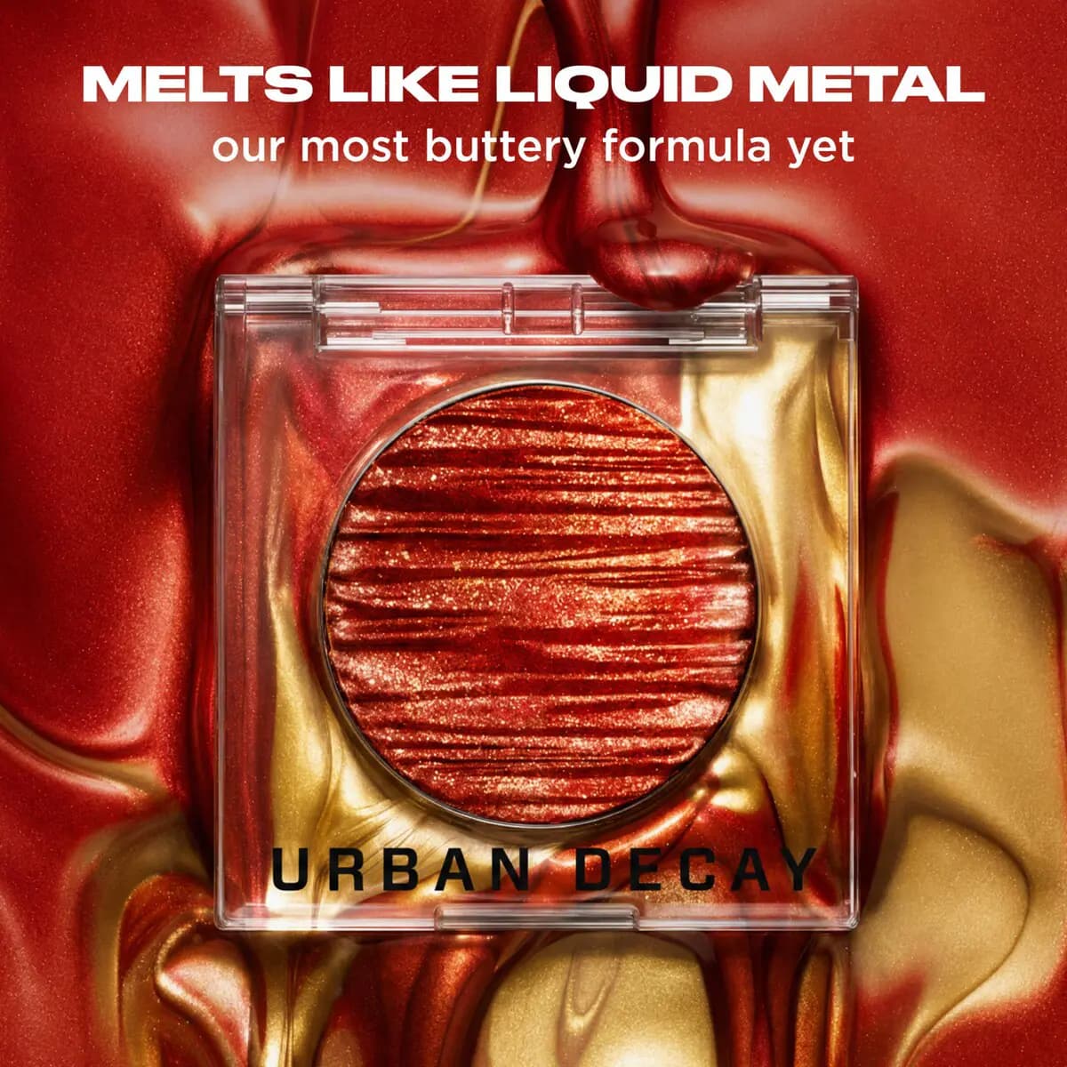 Hot Head compact on a background of molten red and gold metal, with text "Melts like liquid metal.