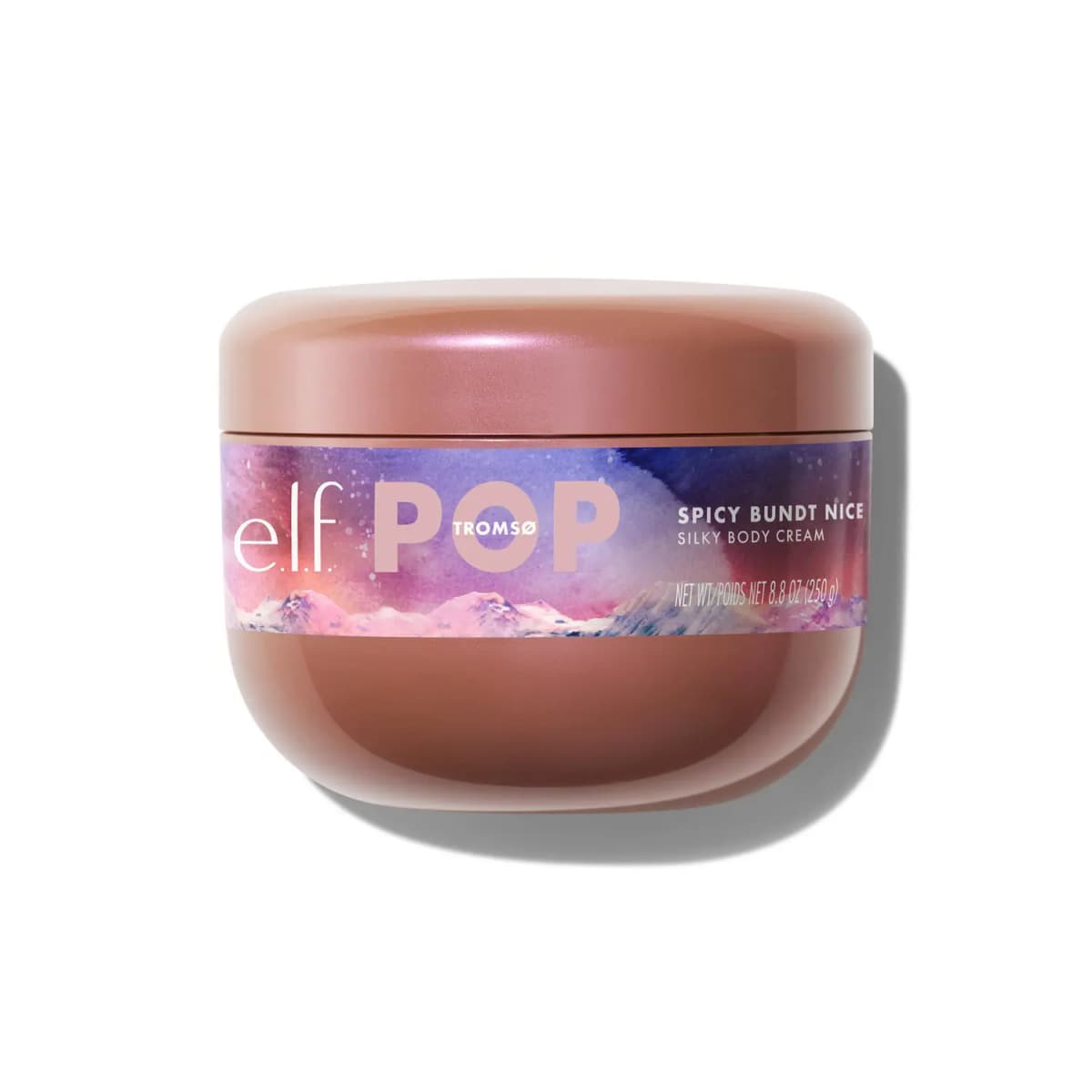 Rose-bronze jar of e.l.f. POP Tromsø Spicy Bundt Nice Silky Body Cream, 8.8 oz, with a purple mountain-scene label.