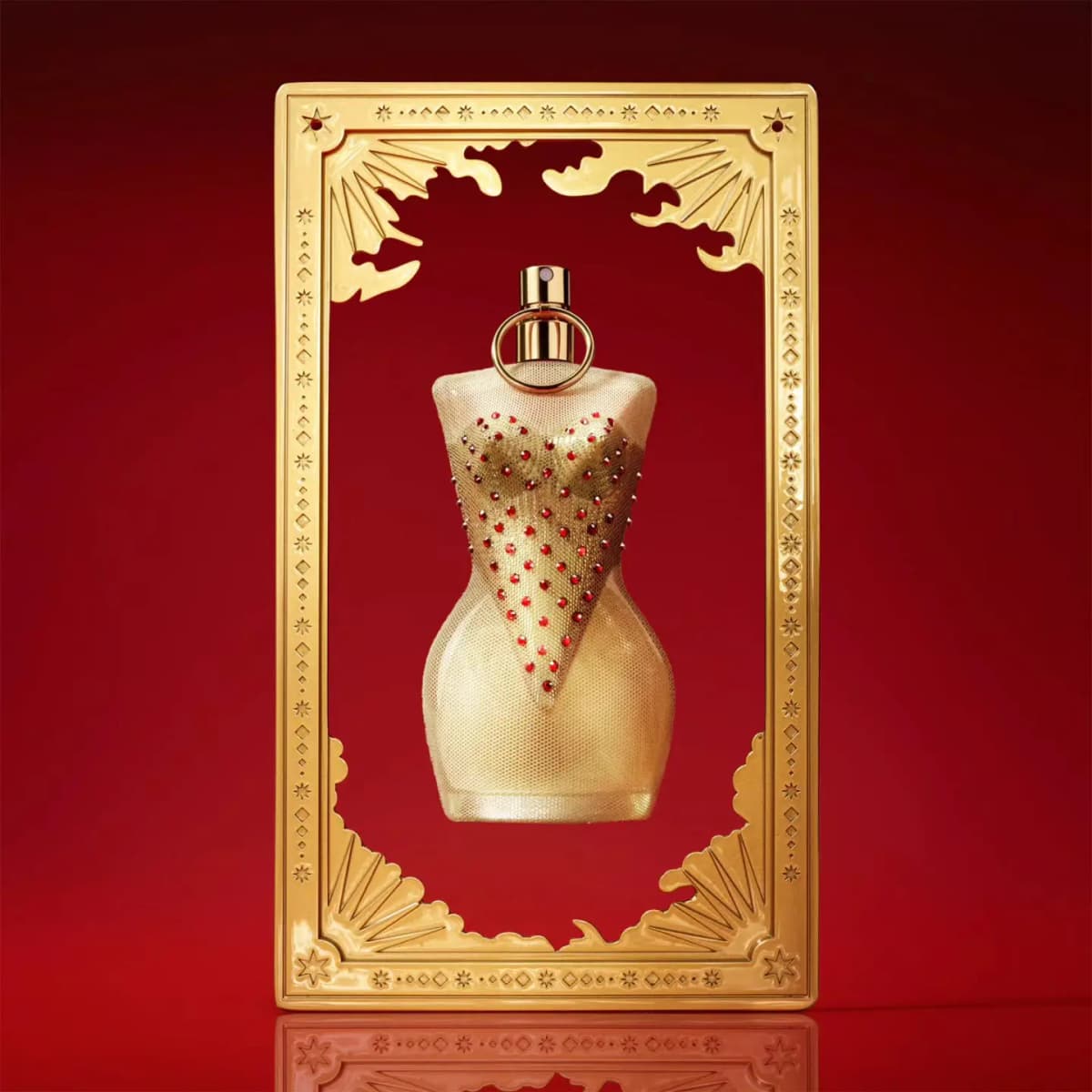 Divine collector bottle floating inside an ornate gold tarot-style frame on a deep red background