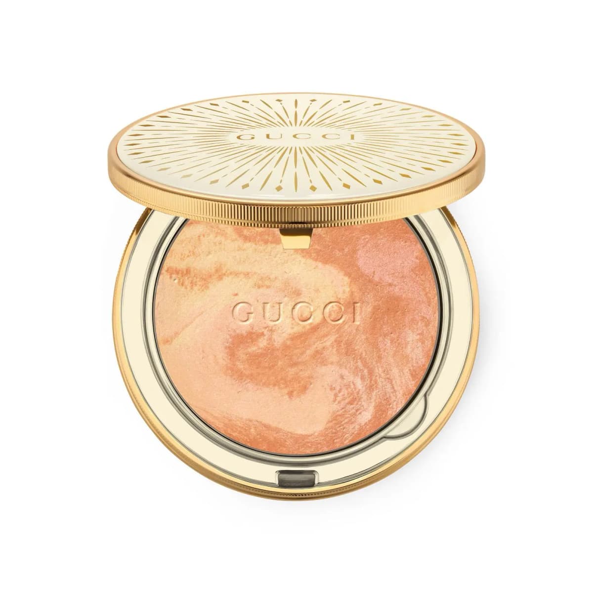 Open gold-trimmed compact holding a swirled apricot, peach and rose-gold marbled powder