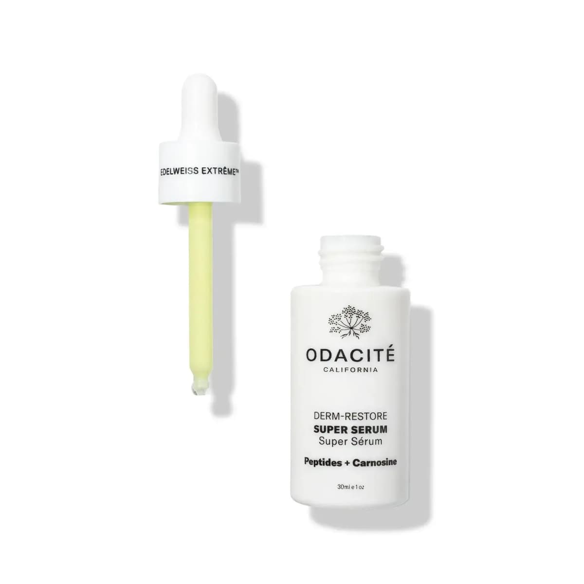 Odacité Derm-Restore Super Serum white bottle beside its Edelweiss Extrême dropper with pale green serum