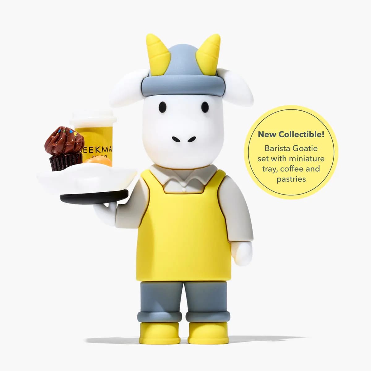 Barista Goatie figure in a yellow apron and grey hat holding a tray with a coffee cup, cupcake and pastry