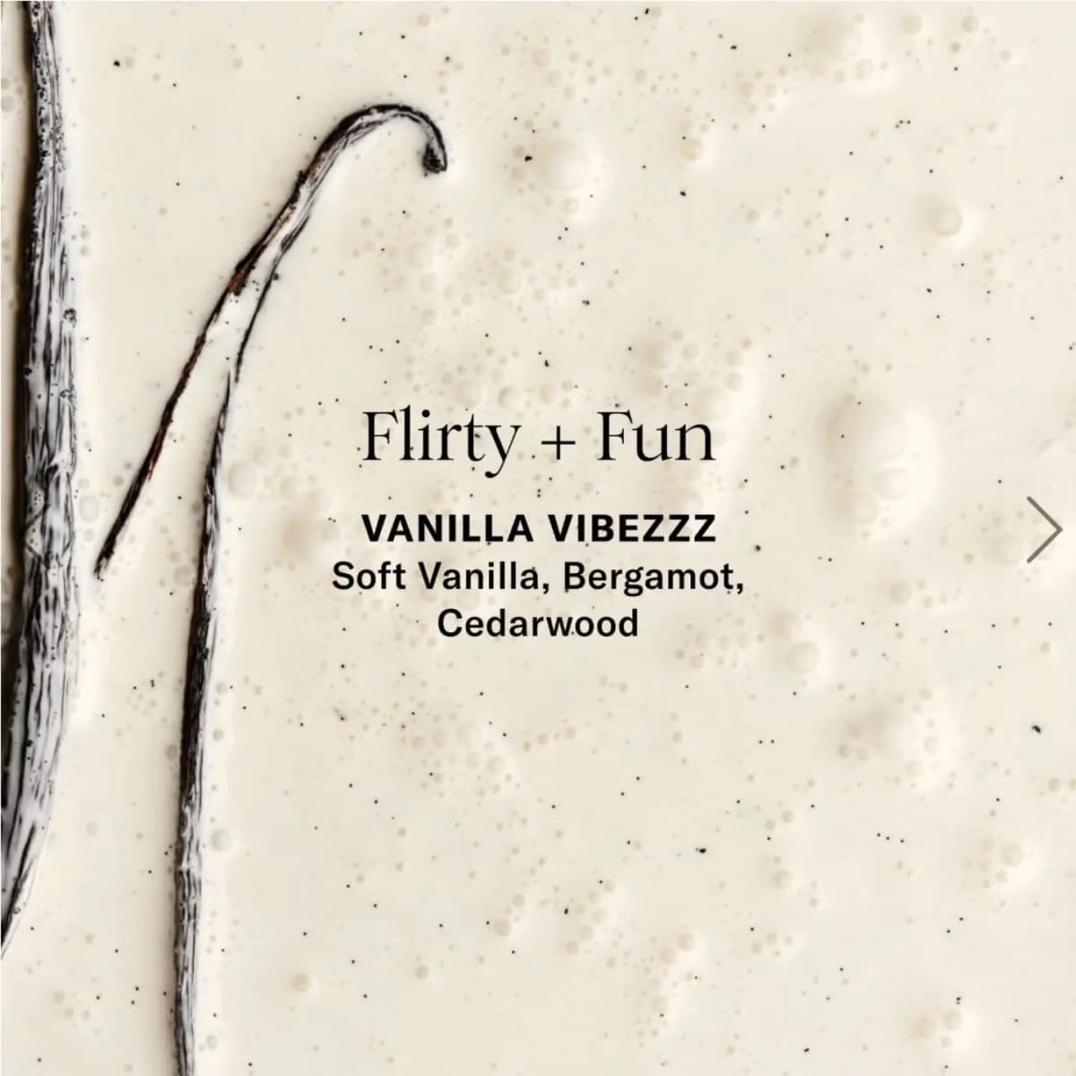 Vanilla pods resting in bubbly cream with text for the Vanilla Vibezzz scent: soft vanilla, bergamot, cedarwood
