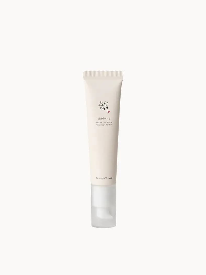 Cream squeeze tube with white pump cap labelled Beauty of Joseon Revive Eye Serum Ginseng + Retinal
