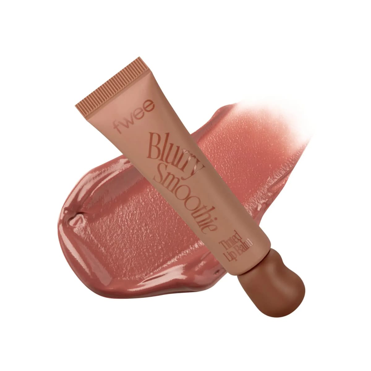 Fwee Blurry Smoothie Tinted Lip Balm in a tan squeeze tube over a creamy rosy-brown swatch.