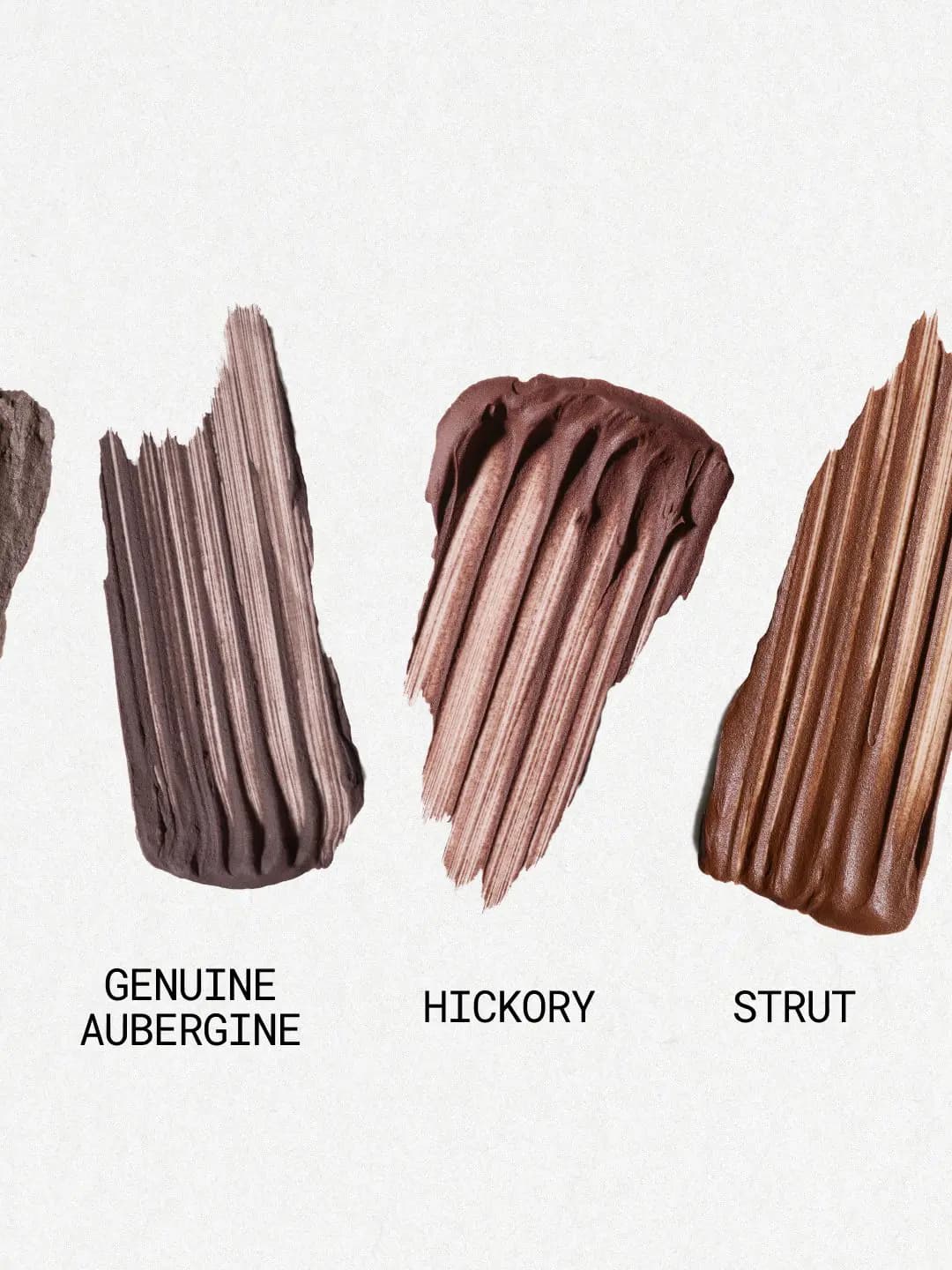 Three creamy swatches labeled Genuine Aubergine, Hickory and Strut in plum, red-brown and warm brown