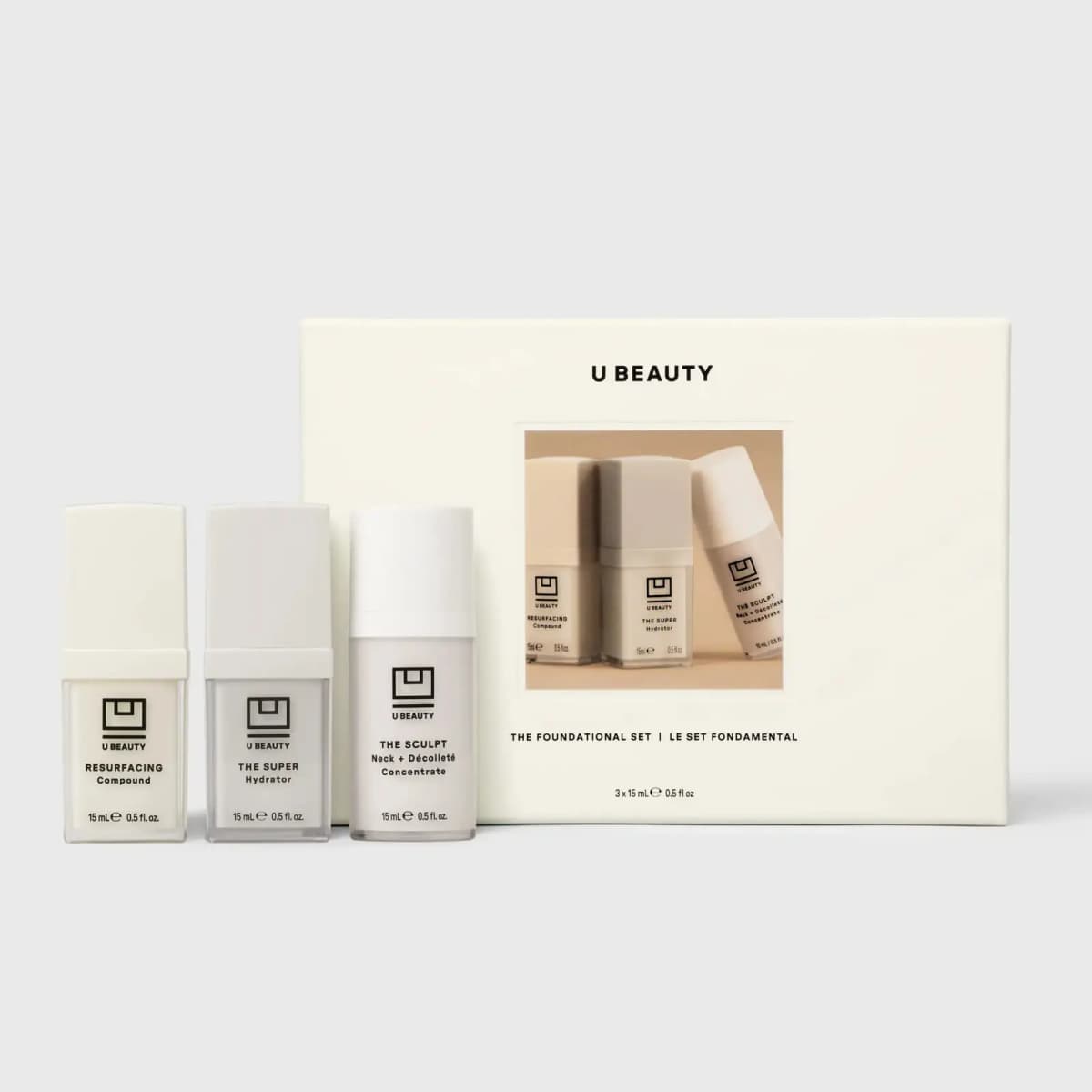 Three 15 mL U Beauty bottles beside the cream Foundational Set box with a beige product photo window