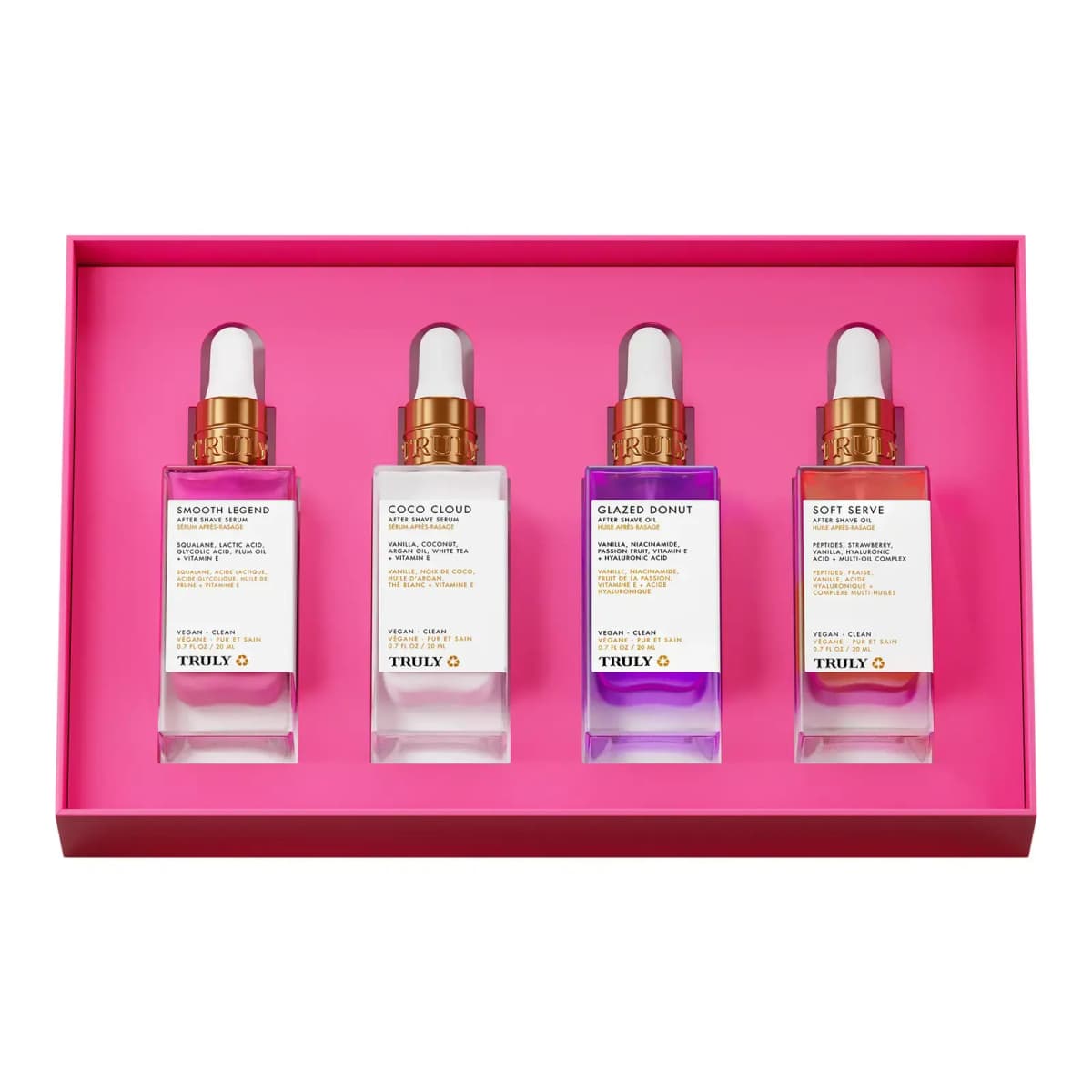 Open hot-pink box holding Smooth Legend, Coco Cloud, Glazed Donut and Soft Serve dropper bottles in a row