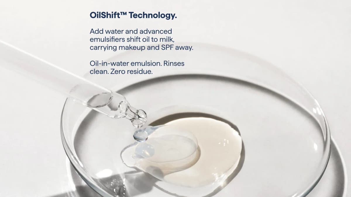 Pipette dropping water onto clear oil in a petri dish, turning it milky, with OilShift Technology text