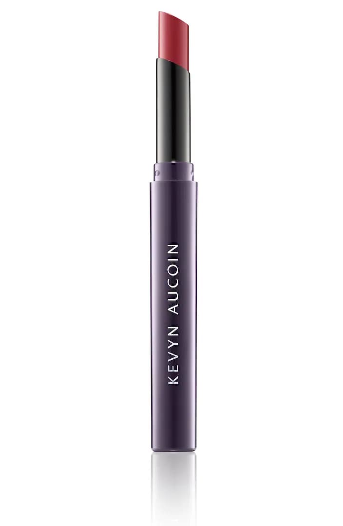 Unforgettable Lipstick in a slim purple tube with Kevyn Aucoin lettering and an angled red bullet