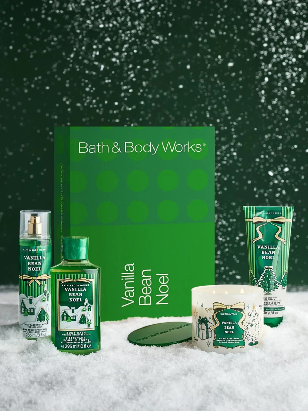 Bath & Body Works Vanilla Bean Noel green box with mist, body wash, three-wick candle and body cream in snow