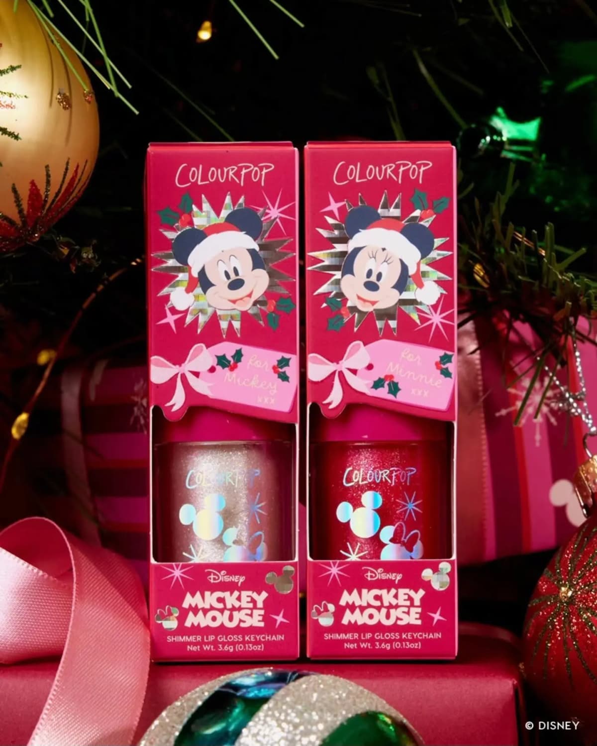 Two Shimmer Lip Gloss Keychain boxes, a clear iridescent gloss for Mickey and a red glitter gloss for Minnie