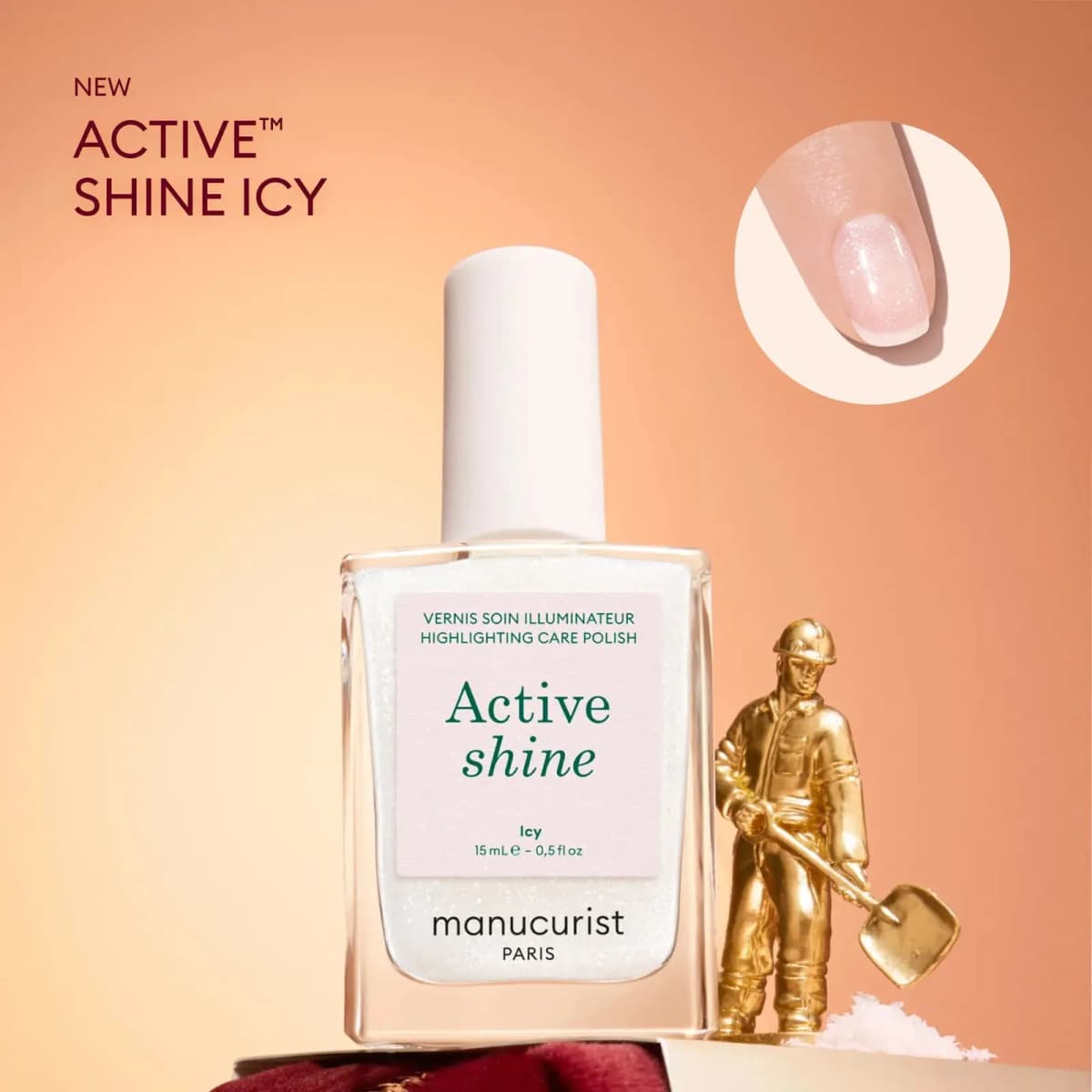 New Active Shine Icy highlighting care polish bottle with shimmery pink nail swatch and gold miniature figurine