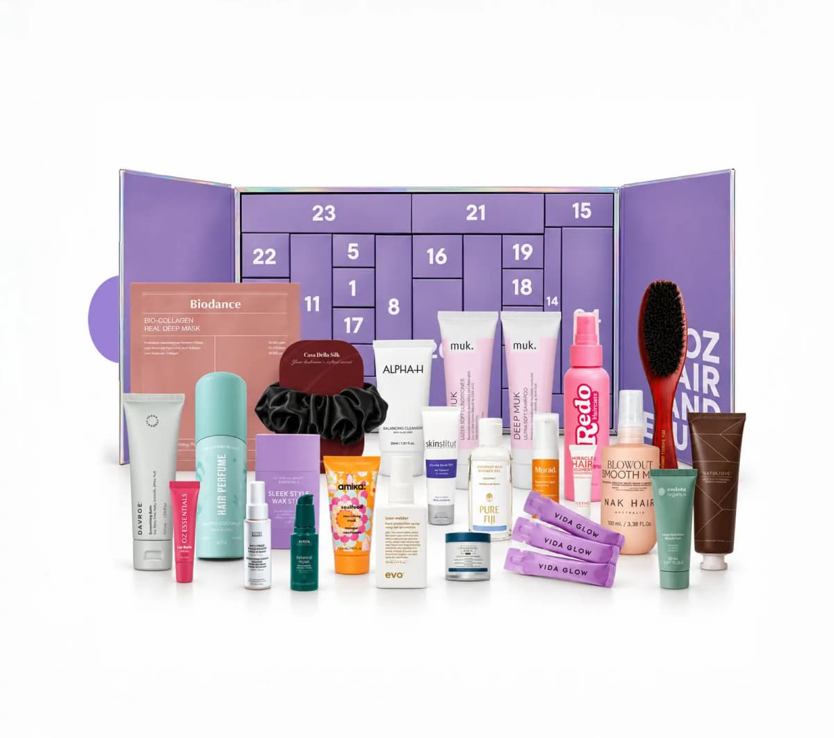Full 24-item lineup including Biodance mask, Muk tubes, Redo spray and a bristle brush in front of the open calendar