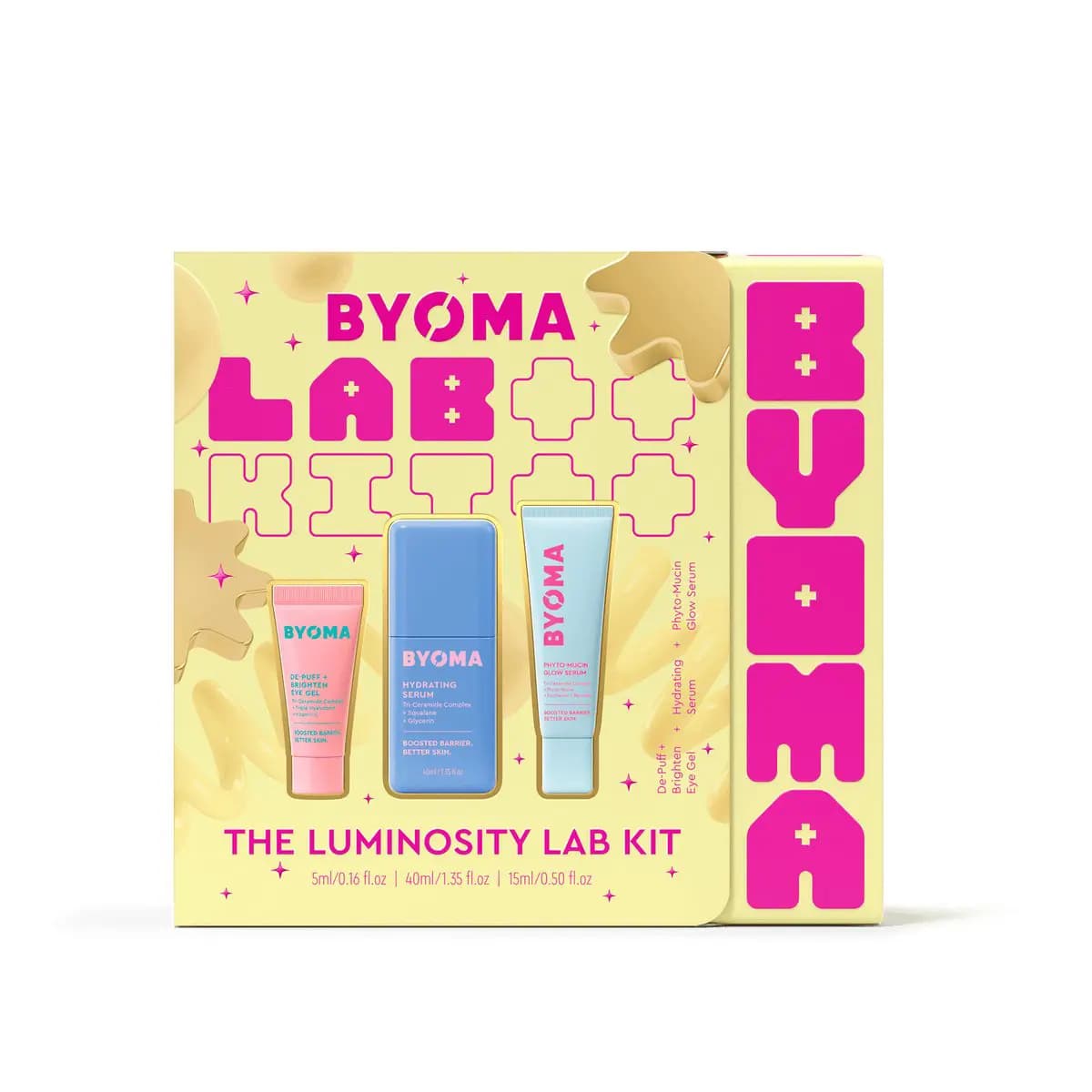 Butter-yellow box for The Luminosity Lab Kit with eye gel, blue serum bottle and glow serum tube