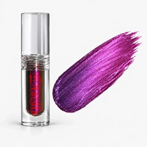 Liquid eyeshadow tube beside a shifting magenta-to-violet metallic swatch on white