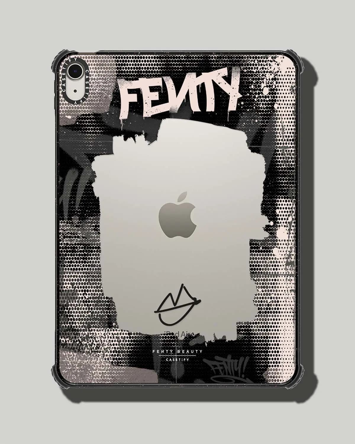 IPad Air case with graffiti "Fenty" lettering, halftone dots and a clear cut-out centre showing the Apple logo