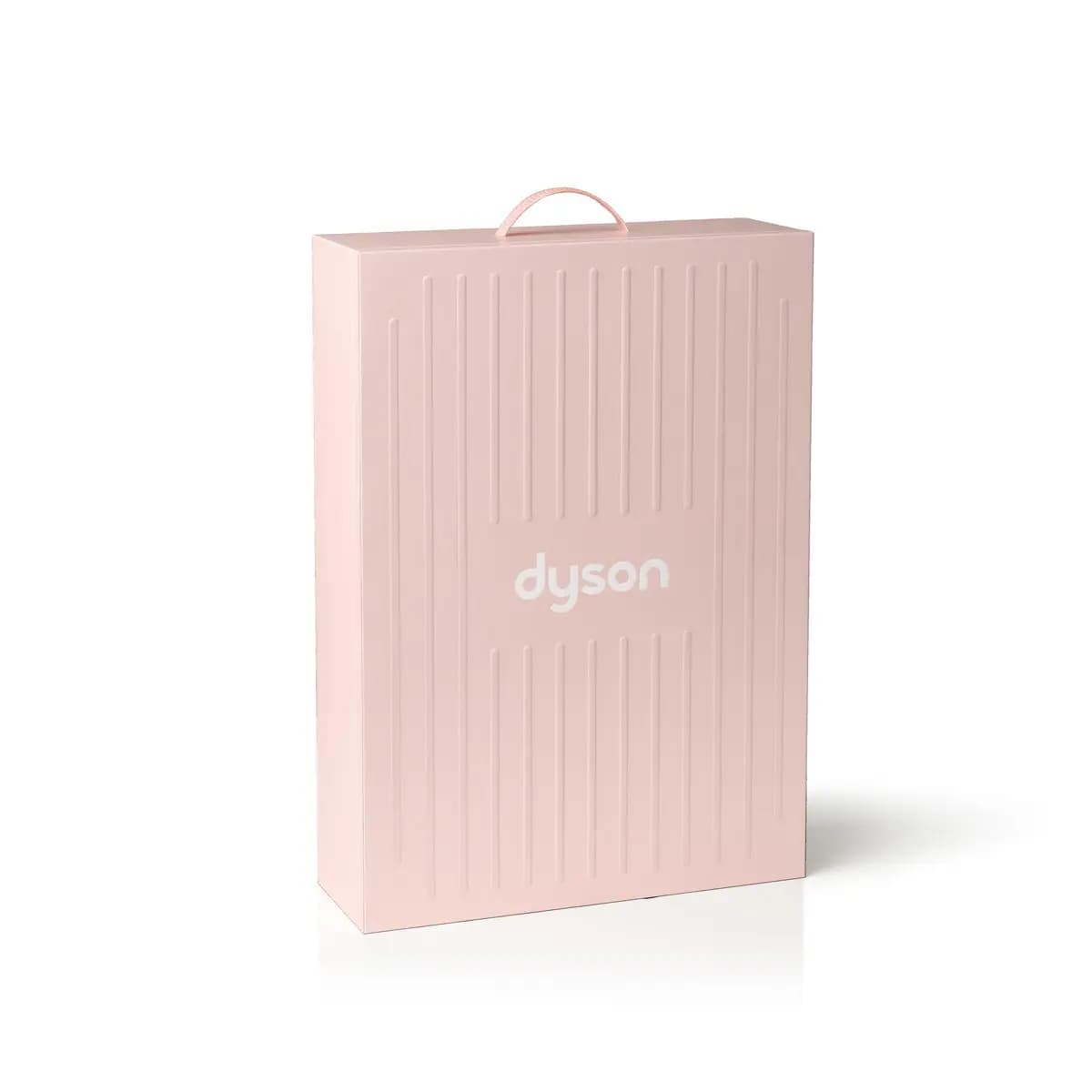 The closed pink box with a vertical ribbed texture, a handle on top and a white dyson logo