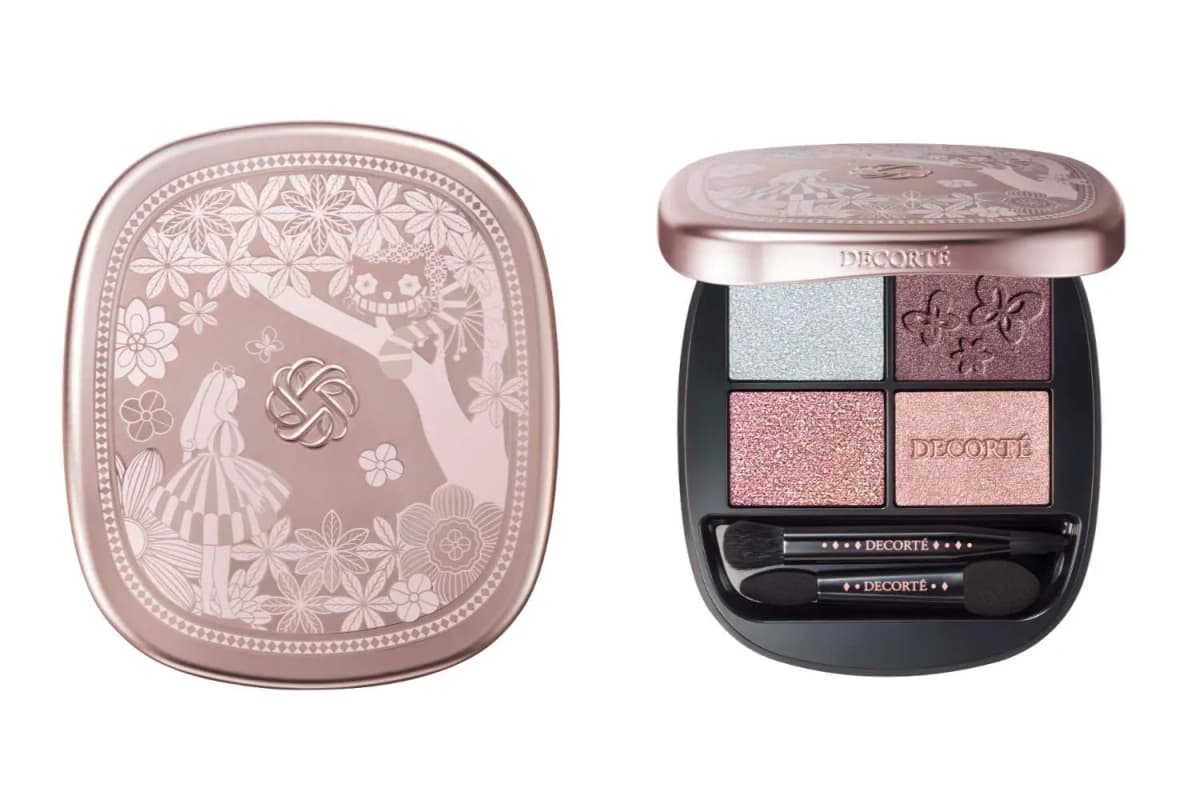 DECORTÉ UNexpected Wonderland palette with Alice and Cheshire Cat lid beside open quad of blue shimmer and mauve pinks